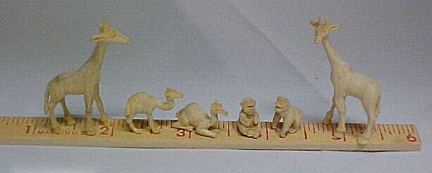 Carved unpainted Ark animals