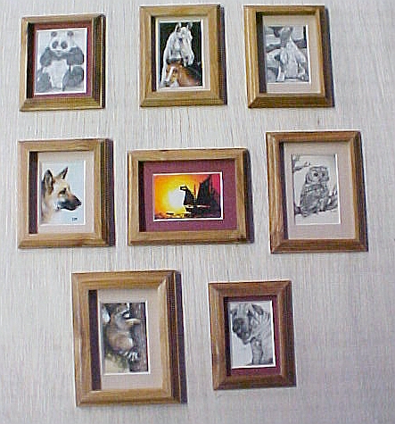 Miniature drawings and paintings, matted and framed.