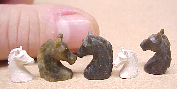 miniature carved stone horses