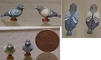 Hand carved hand painted wood pigeons